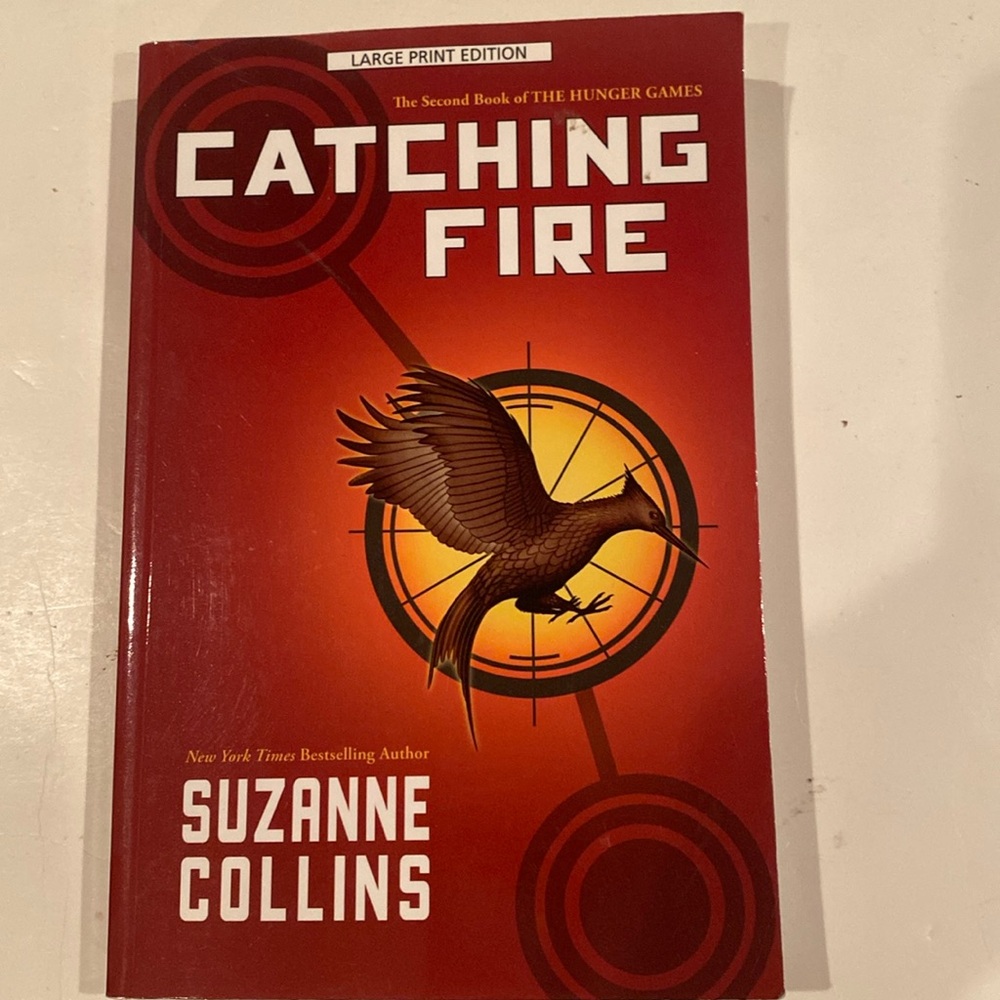 “Catching Fire,” The second book of the Hunger Games. Paperback, LARGE PRINT
